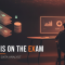 Databricks Certified Data Analyst Associate exam banner showing an analyst curating datasets and an AI answering panel beside SQL dashboards